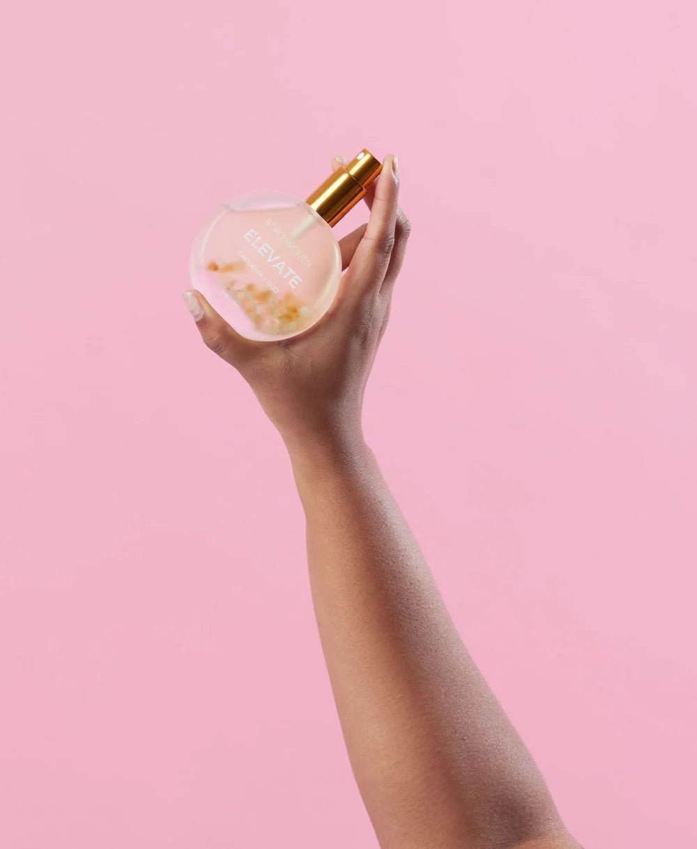 Bopo Women Elevate Body Mist women is holding