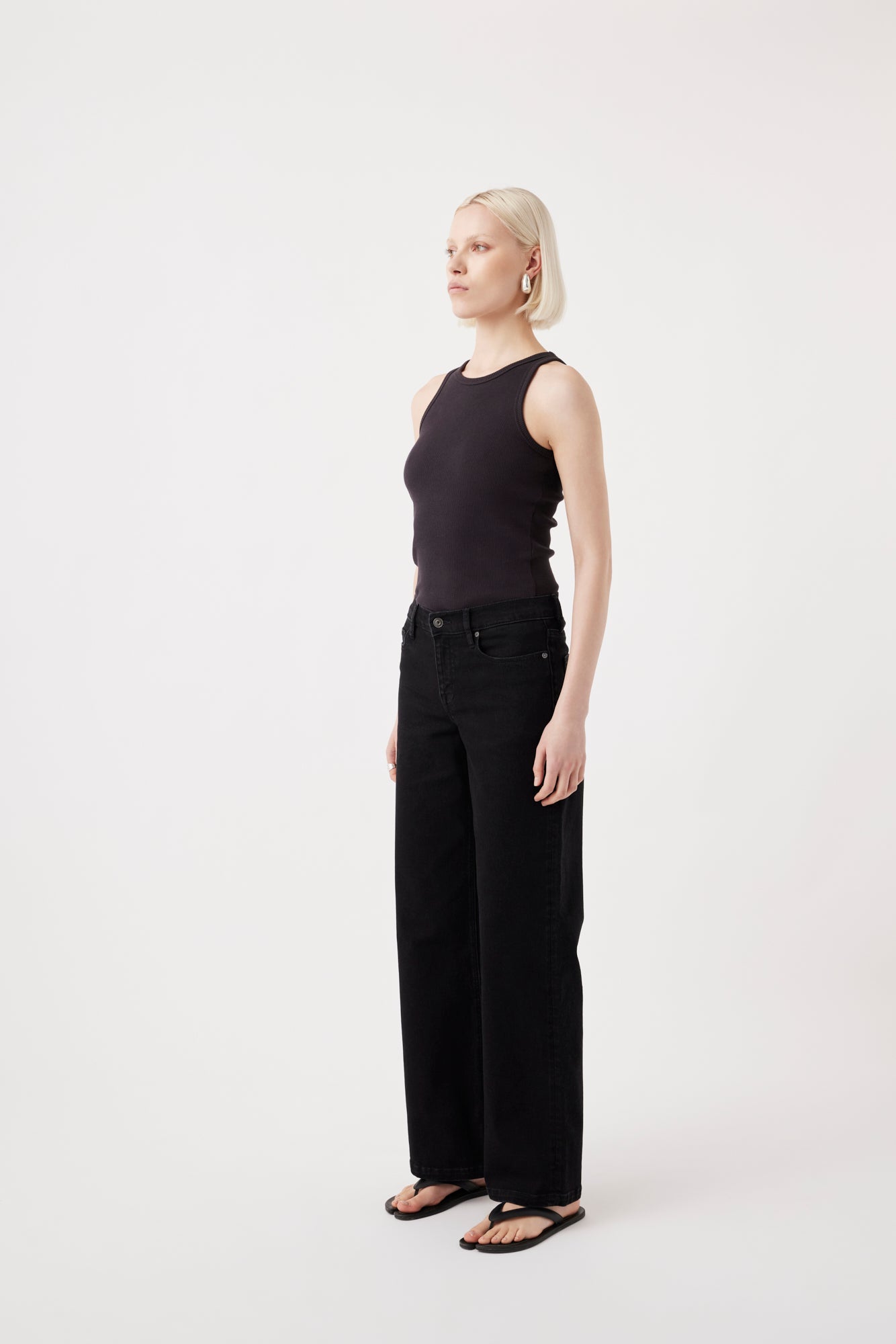 Outland Denim – wide leg black denim in Mia side angle