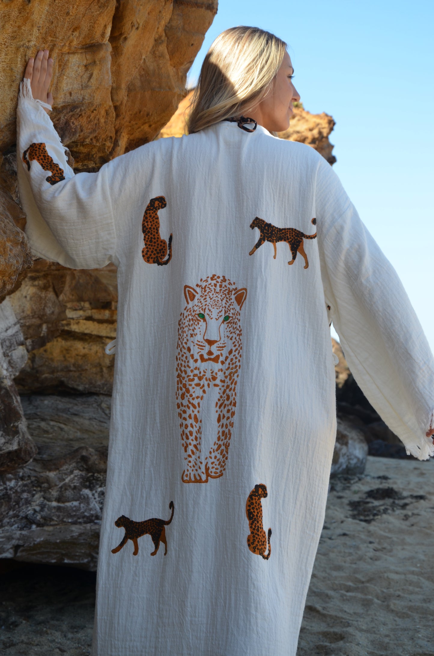 Patara Life Cheetah robe looking to the side