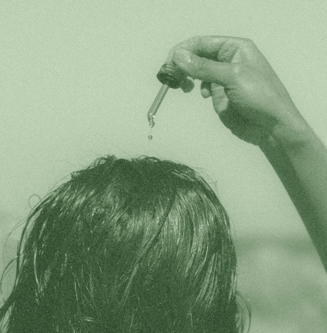 Hinu hair oil applying to scalp