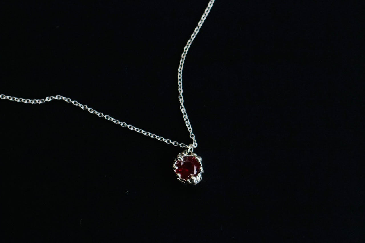 Karlek sterling silver necklace with ruby close up