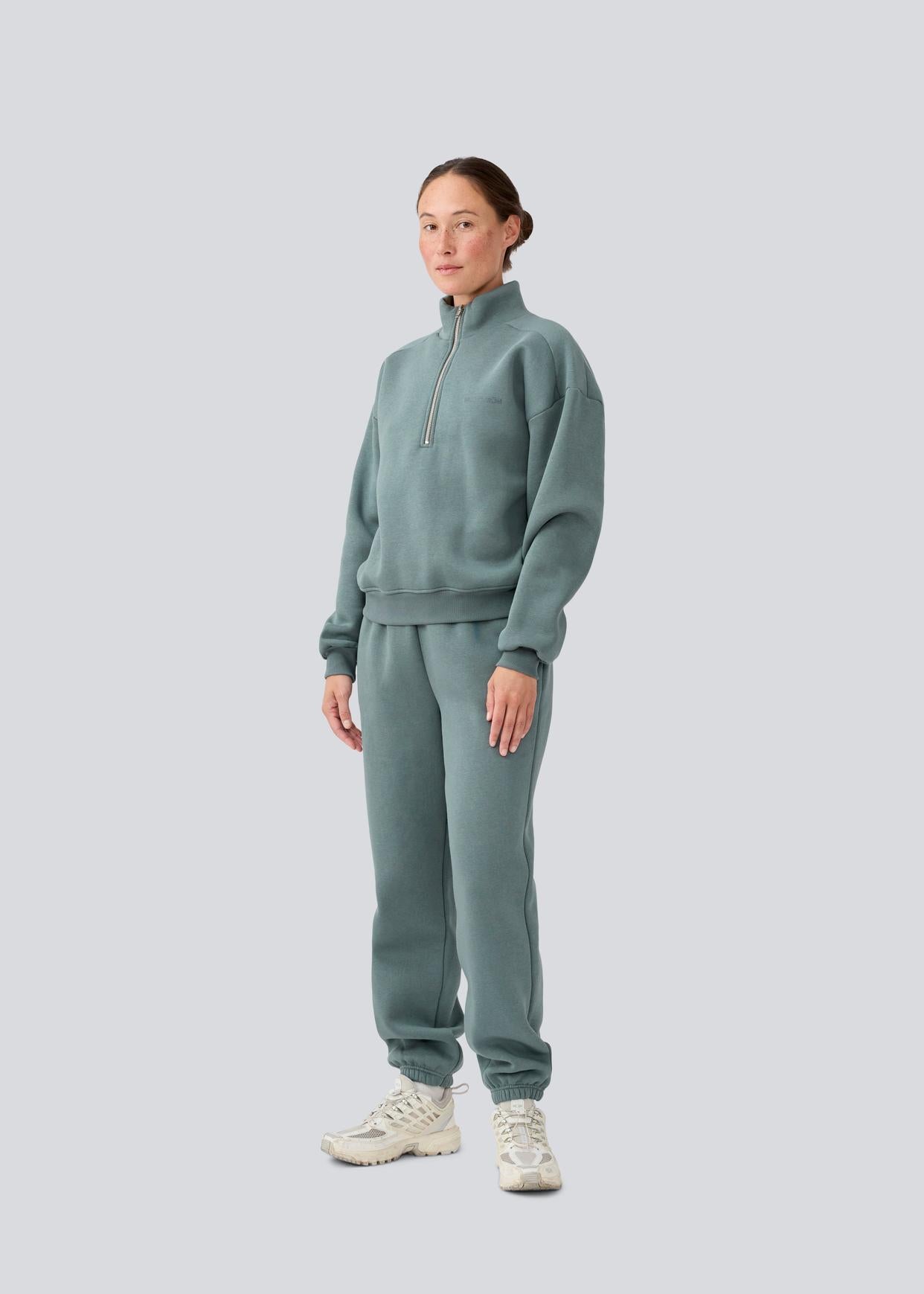 Modstrom Tia MD T Neck Sweater – Balsam Green on model front shot