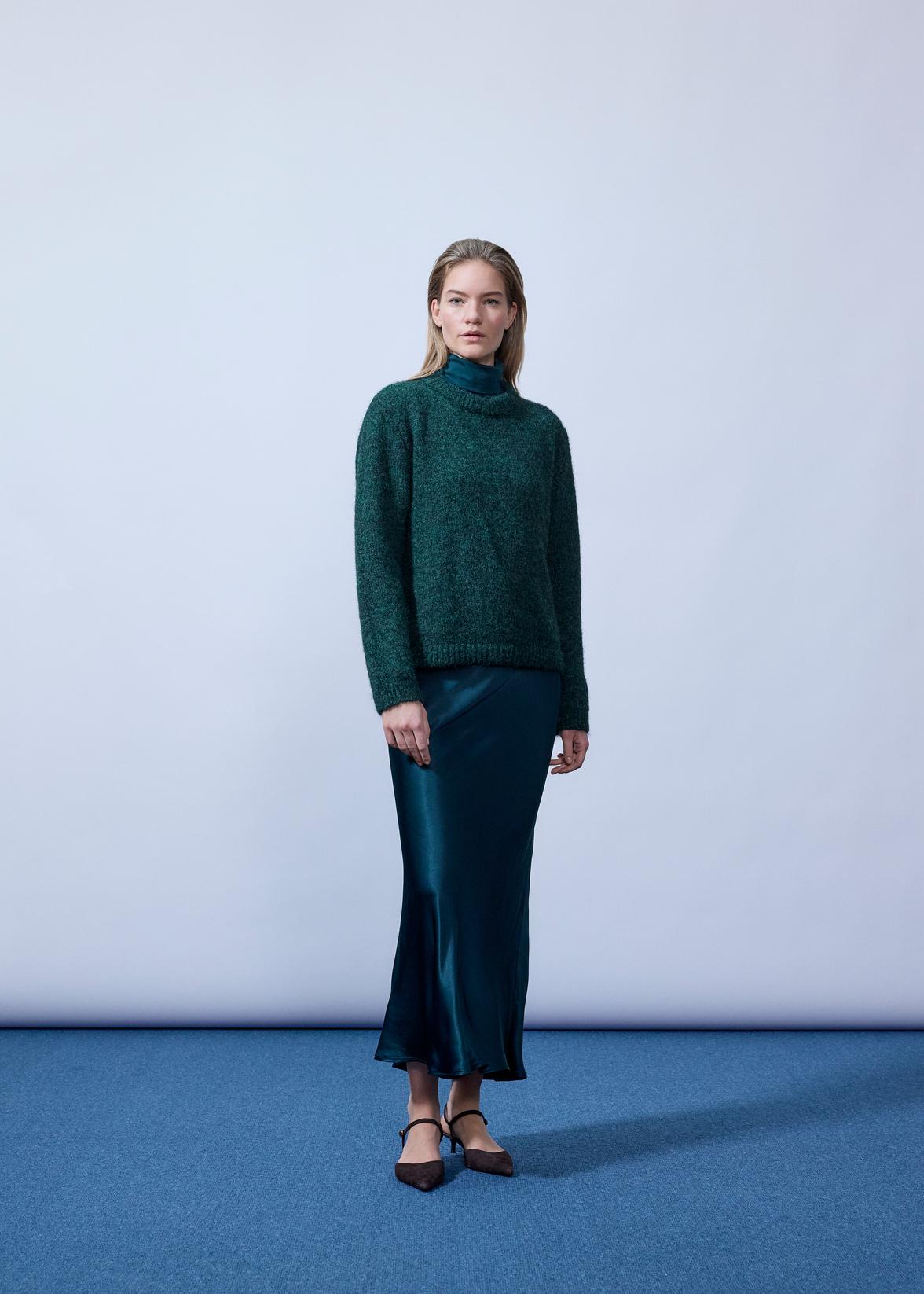 Modstrom Philip md o-neck jumper in bottle green on model with turtleneck