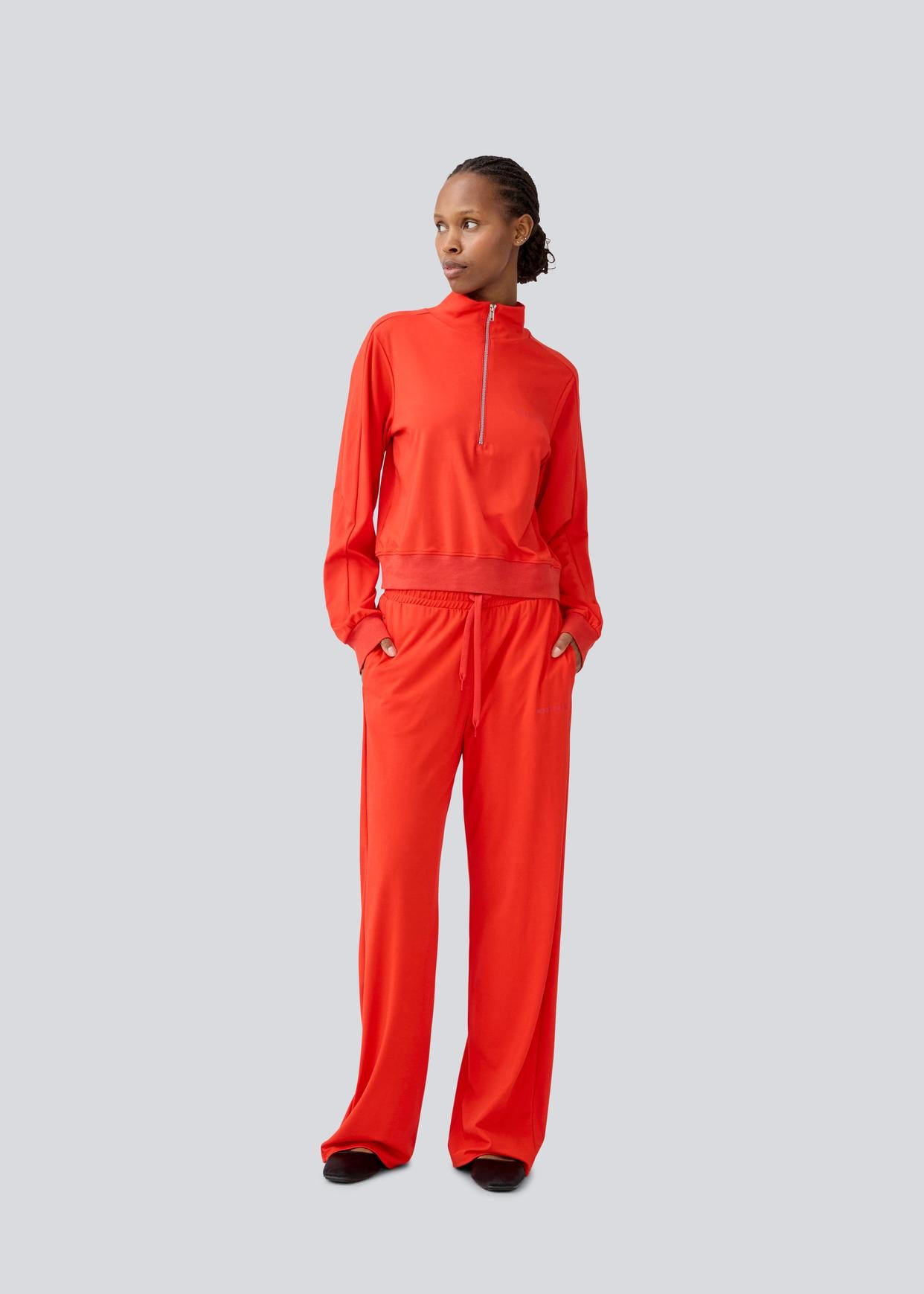 Modstrom Marietta MD T-neck Sweater – Fire Red on model front shot