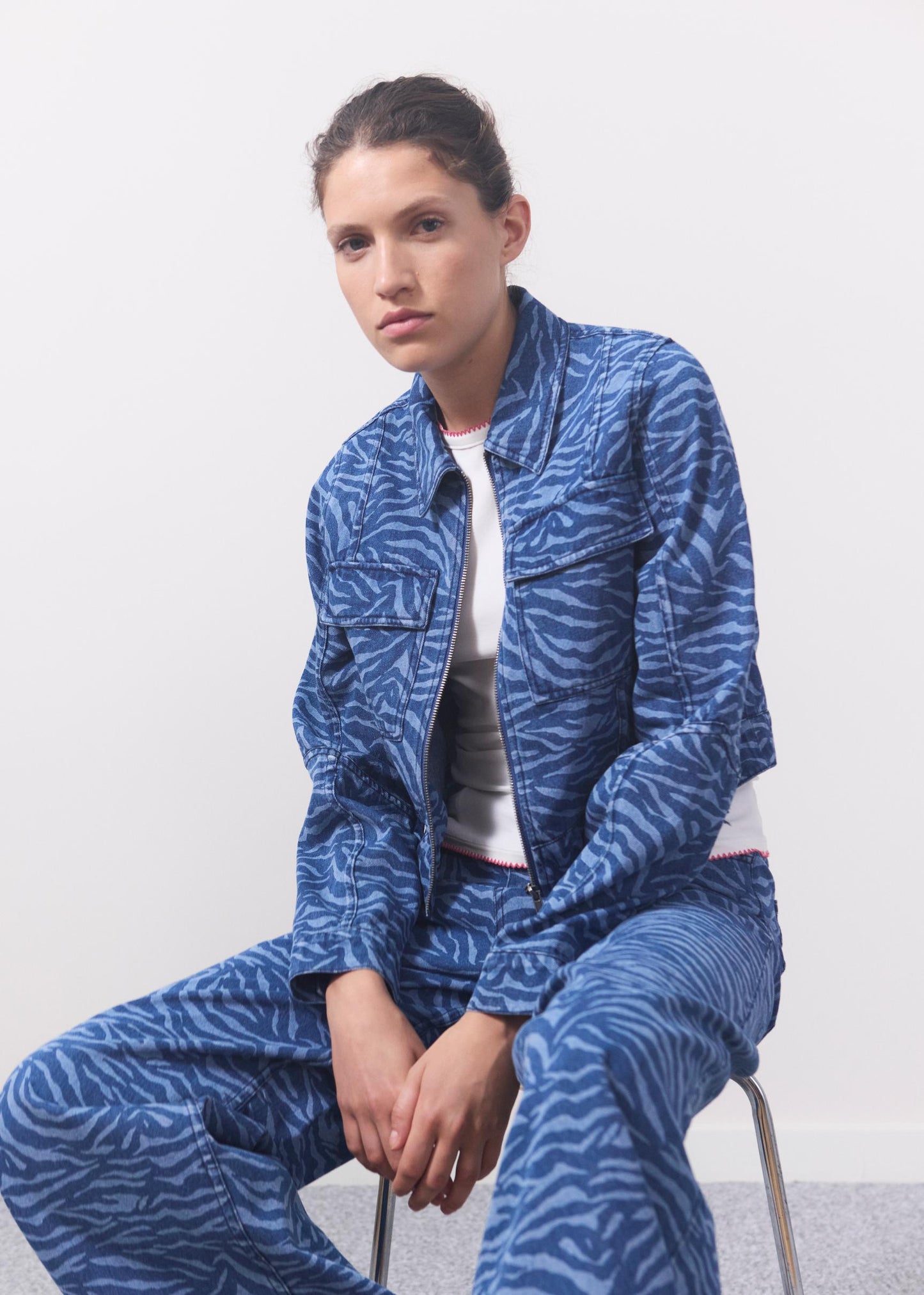 Modstrom Mase MD Jacket – Blue Zebra campaign shot model on chair