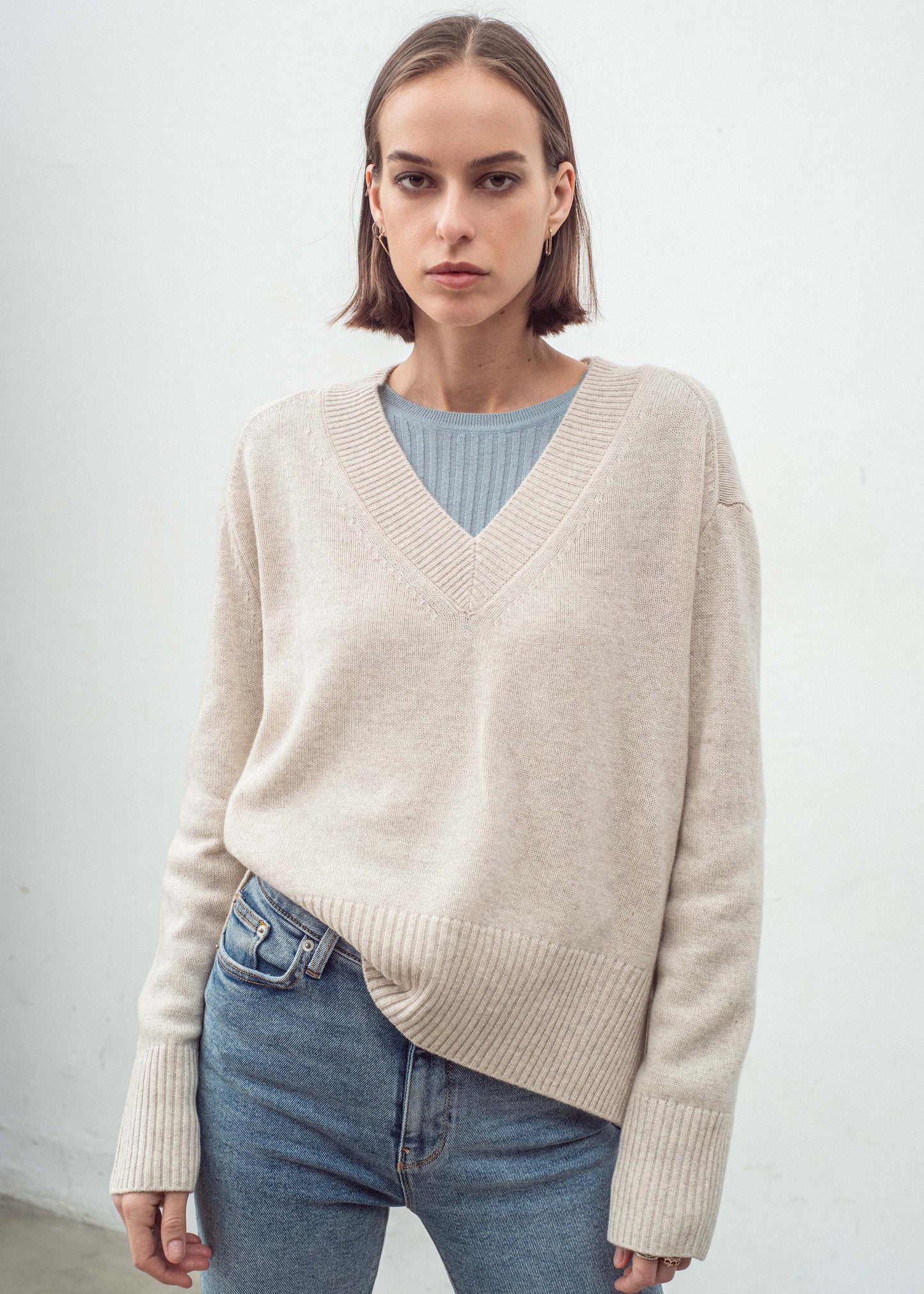 Aleger v-neck sweater shell tucked in
