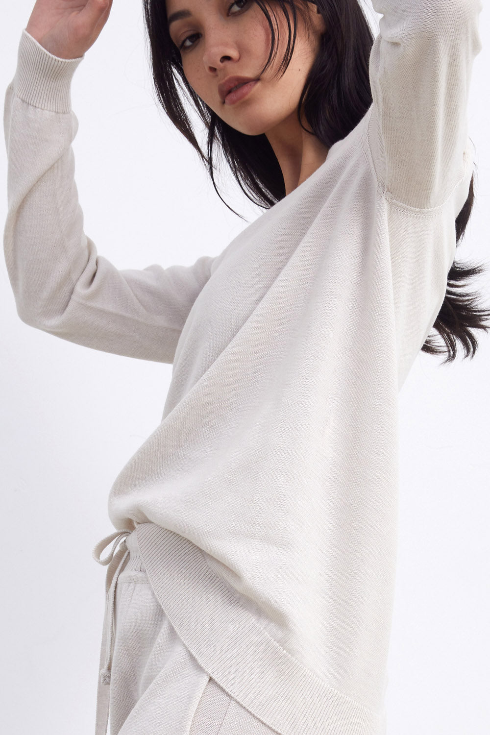 Standard Issue merino v-neck slouchy sweater in alabaster white side angle