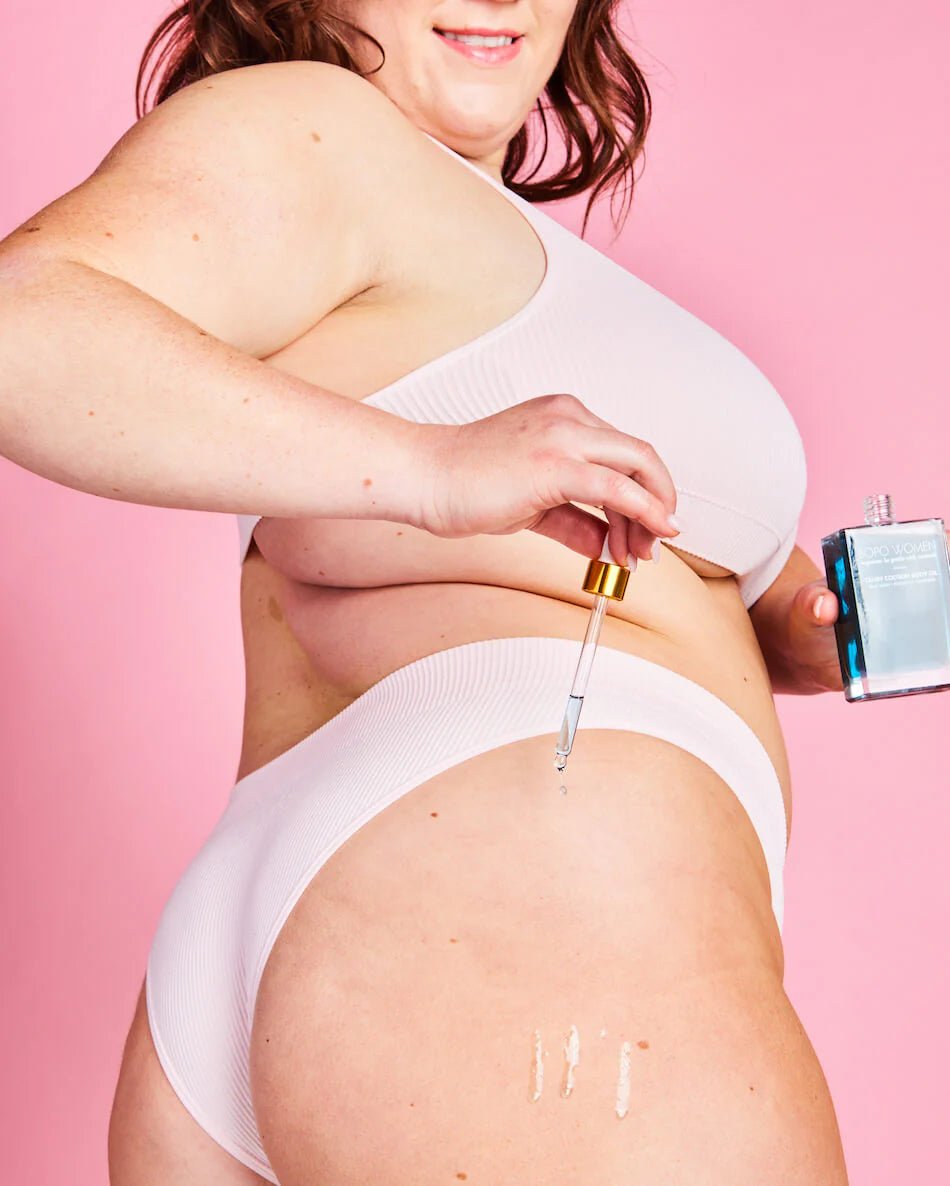 Bopo Tansy cocoon body oil being applied on the body