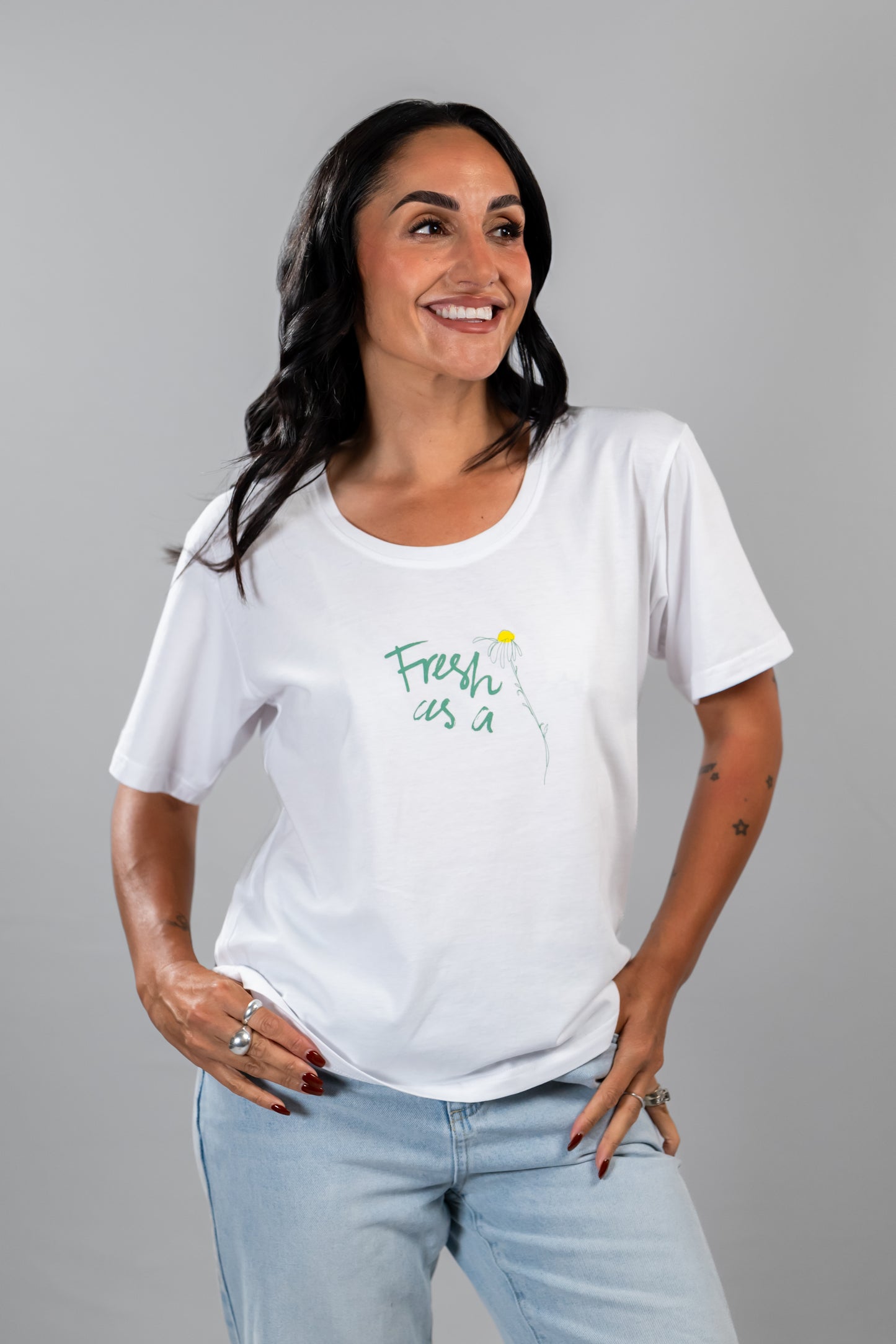 Nina Daisy classic white women's tee – fresh as a daisy front on hands on hips