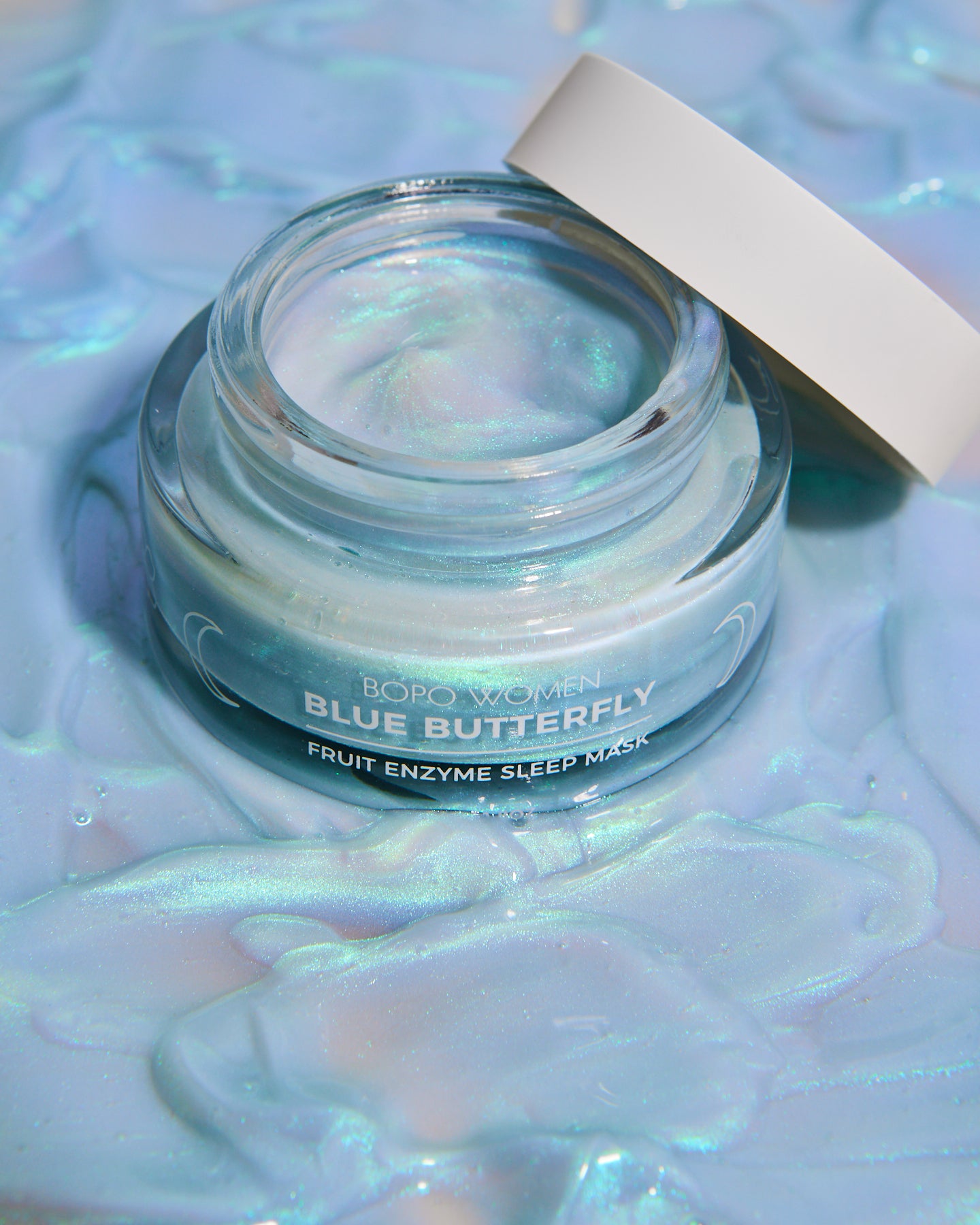 blue butterfly sleeping mask with lid off