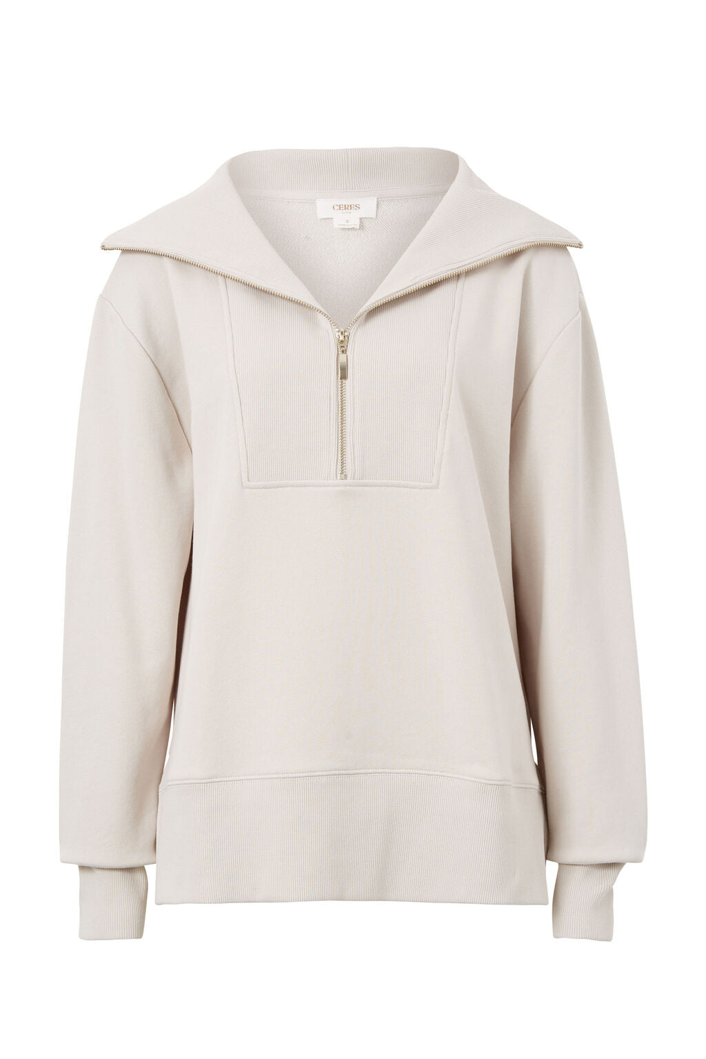 ceres half zip in almond flat lay