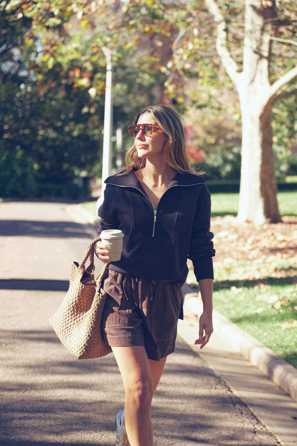 ceres half zip sweater on model walking
