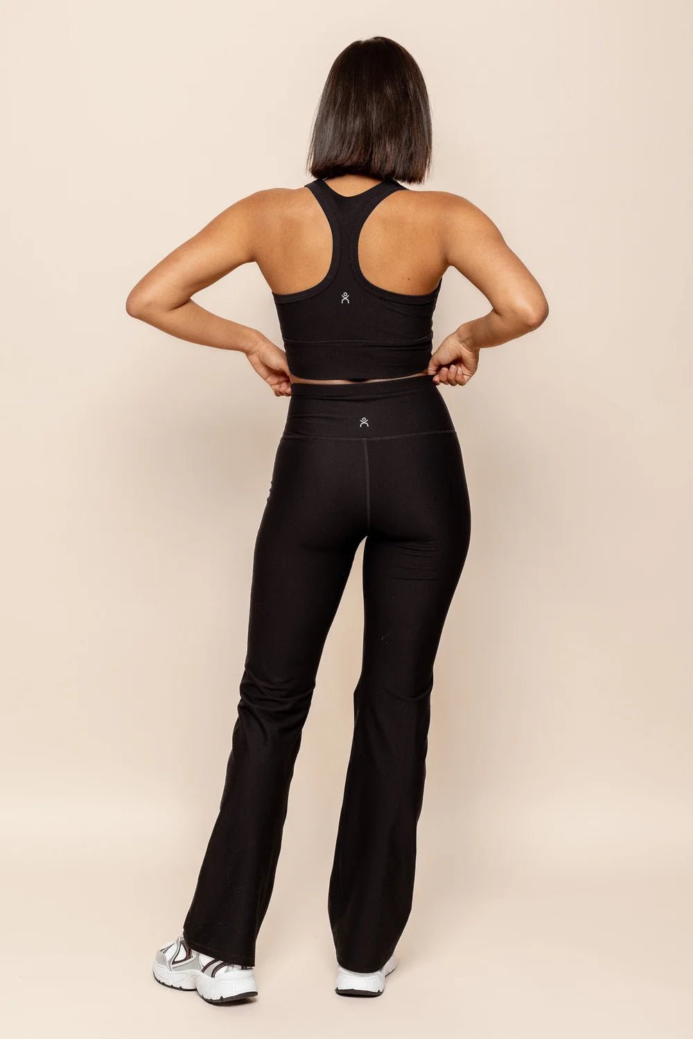 DK Active flare pant in black back shot
