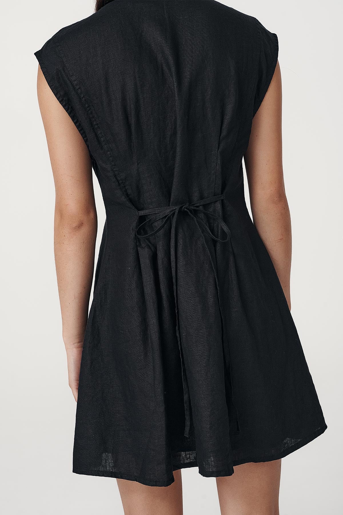 Rowie the label Mira dress in noir studio back shot close up