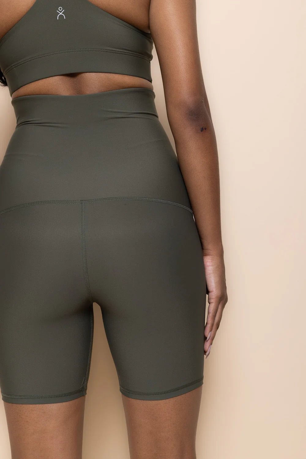 DK Active support bike pant in khaki back shot close up