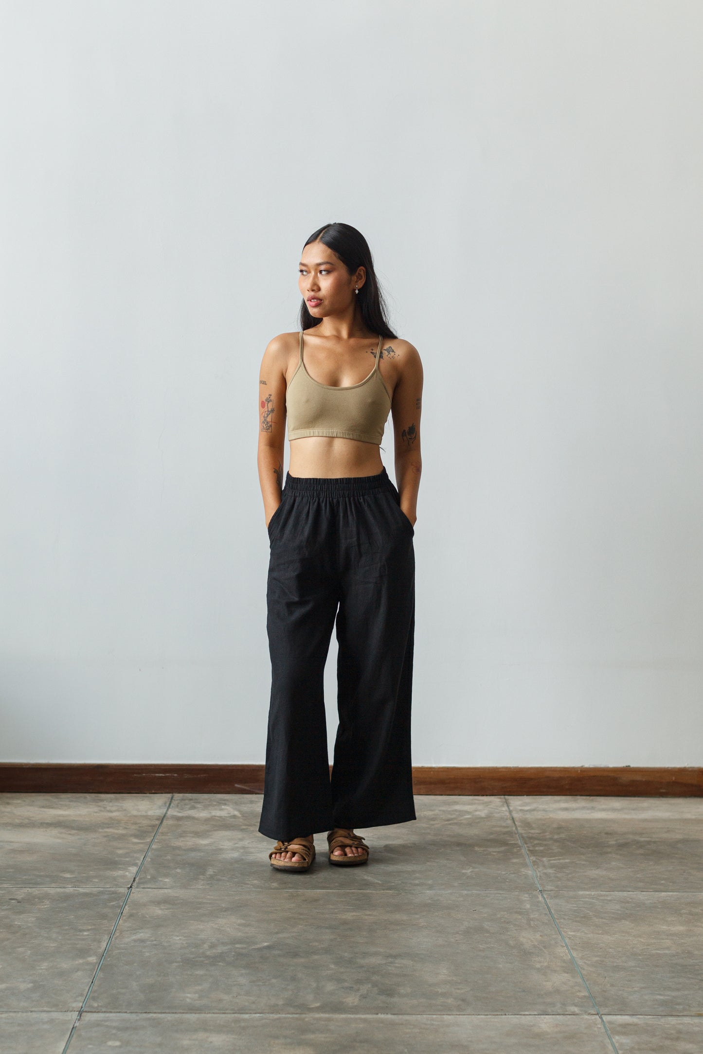 Dorsu wide leg linen pants in black hands in pockets