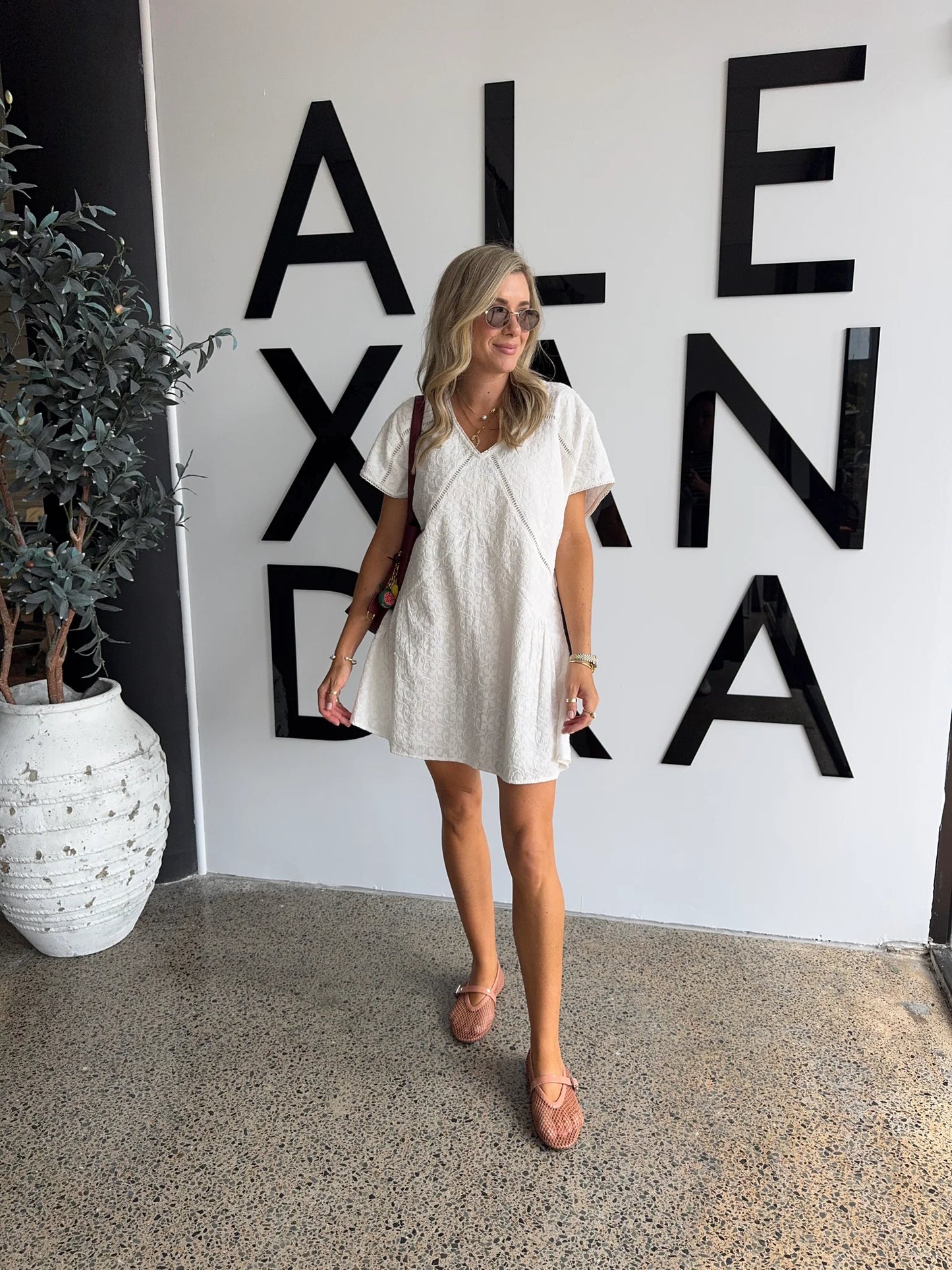 Alexandra Isaac dress in white 4
