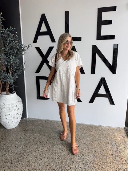 Alexandra Isaac dress in white 4