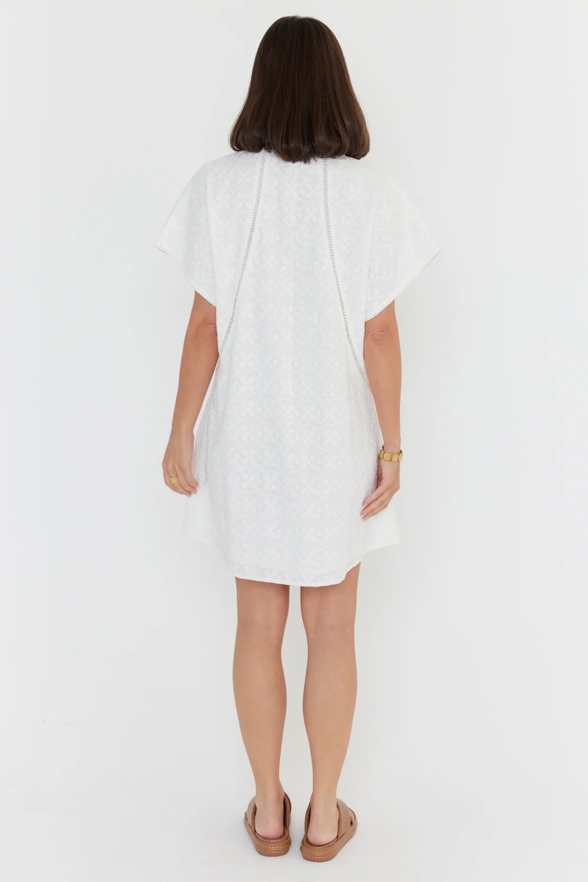 Alexandra Isaac dress in white back shot