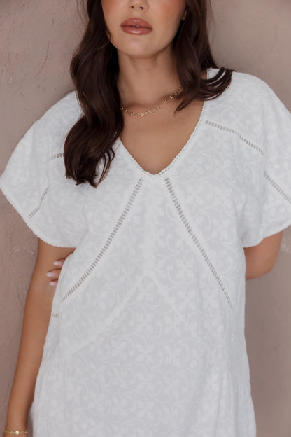 Alexandra Isaac dress in white close up 2