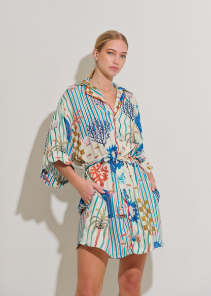 Asha 11 Mbau Dress - Tides hands in pockets 2