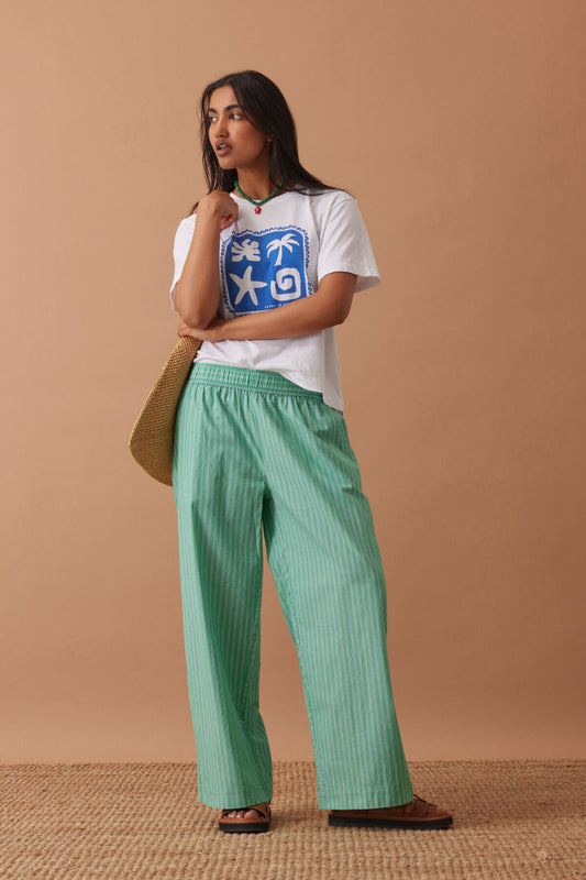 Ceres Life The Lounge Pant – Zesty Green Triple Stripe on model 1