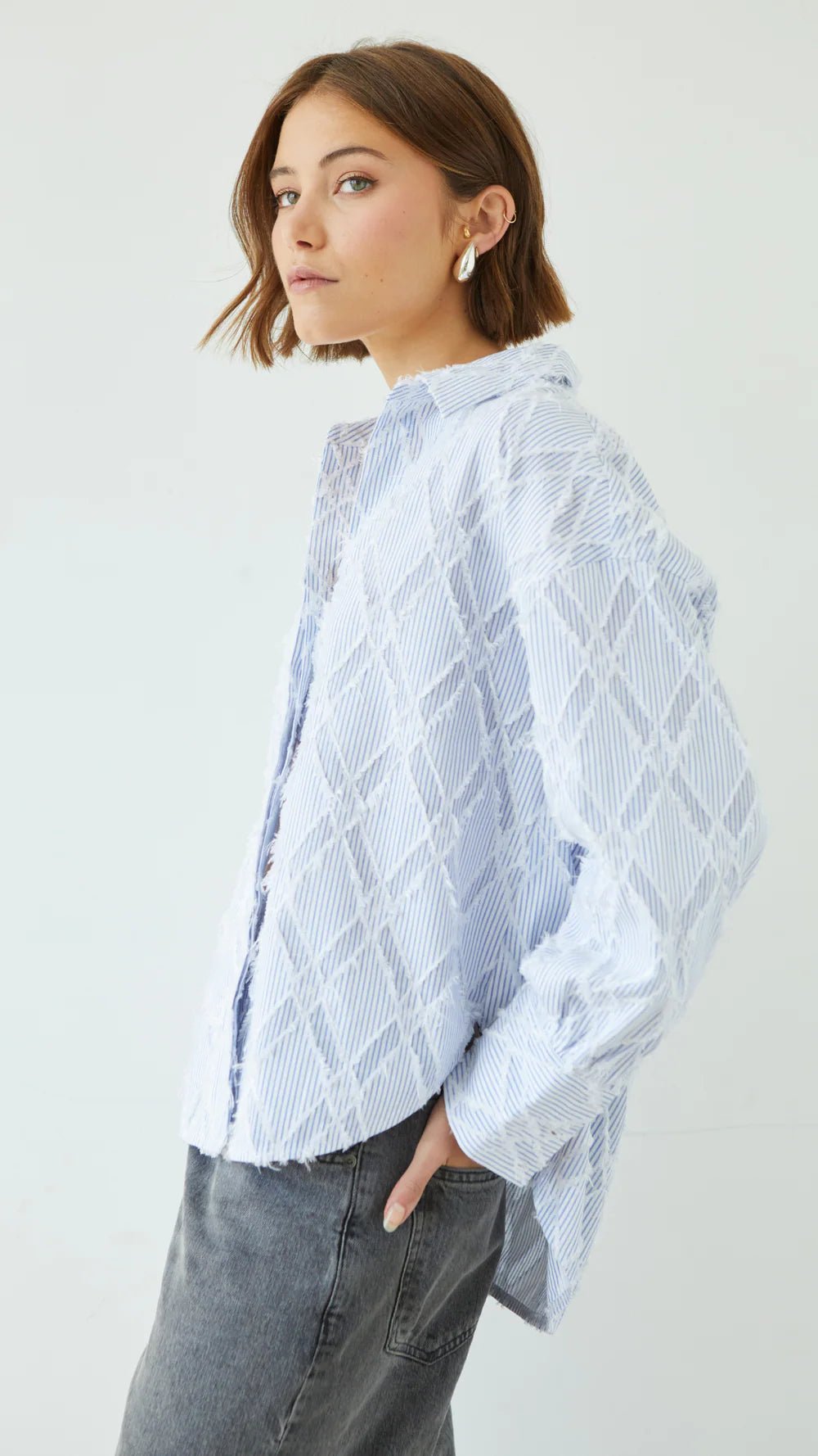 Charli Marlowe Shirt in blue stripe side on angle 2