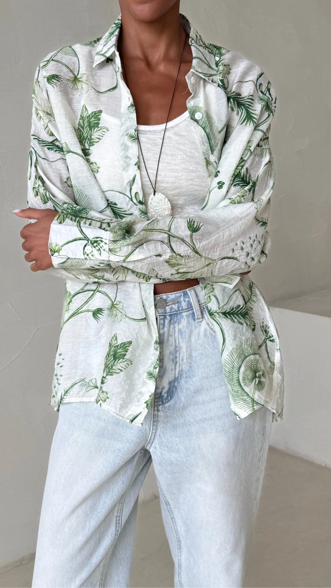 Charli Maxine shirt in green hands wrappoed around
