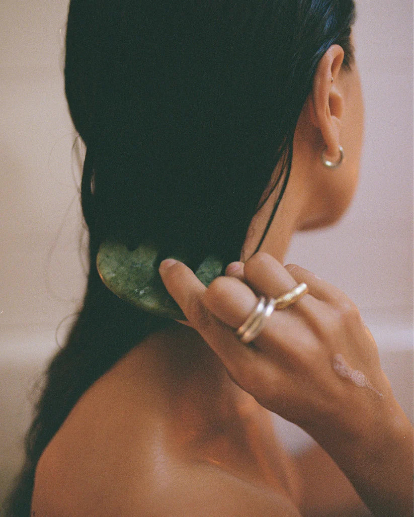 Jade scalp stiumlator in hair