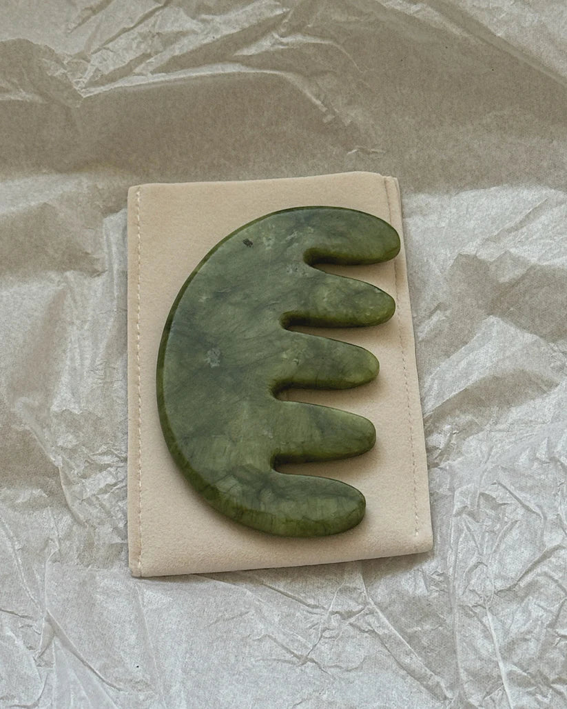 Jade scalp stimulator on pouch