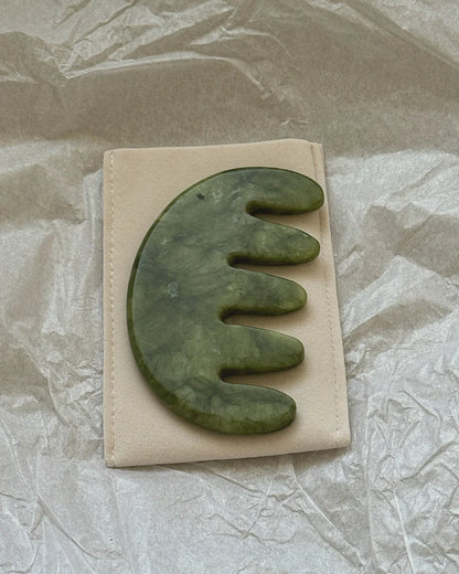 Jade scalp stimulator on pouch
