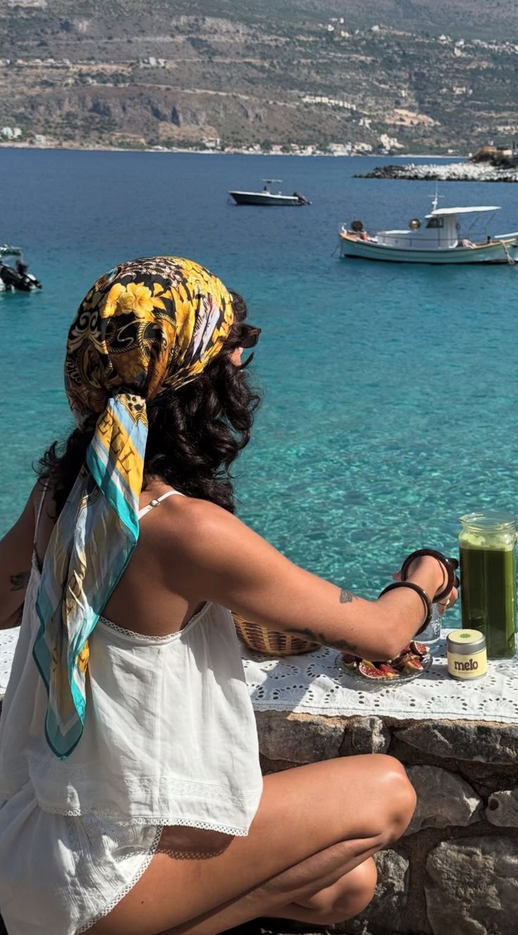 Woman on holiday wearing colourful headscarf 