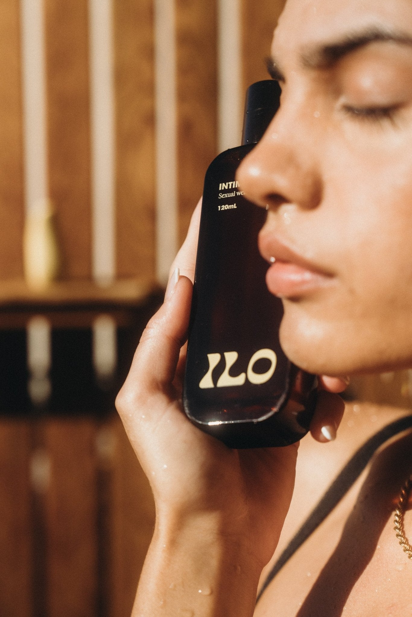 Ilo Wellness intimate wash with model