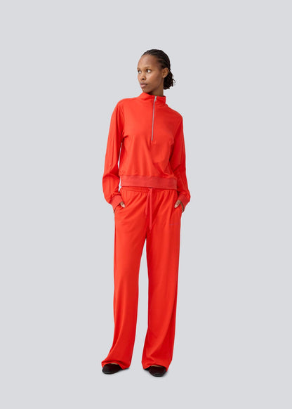 Modstrom Marietta MD T-neck Sweater – Fire Red on model front shot 