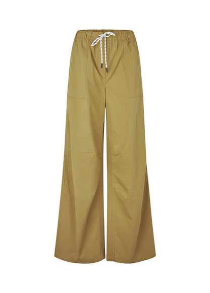 Modström Urania md pants in desert – flat lay front 