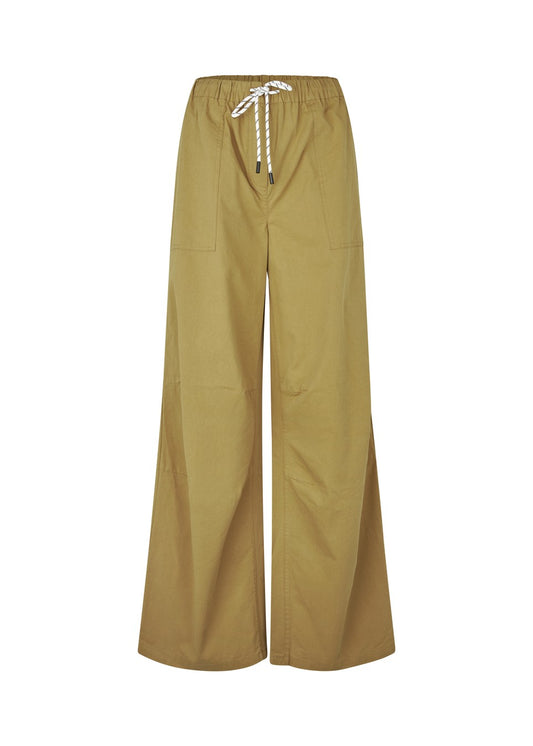 Modström Urania md pants in desert – flat lay front 