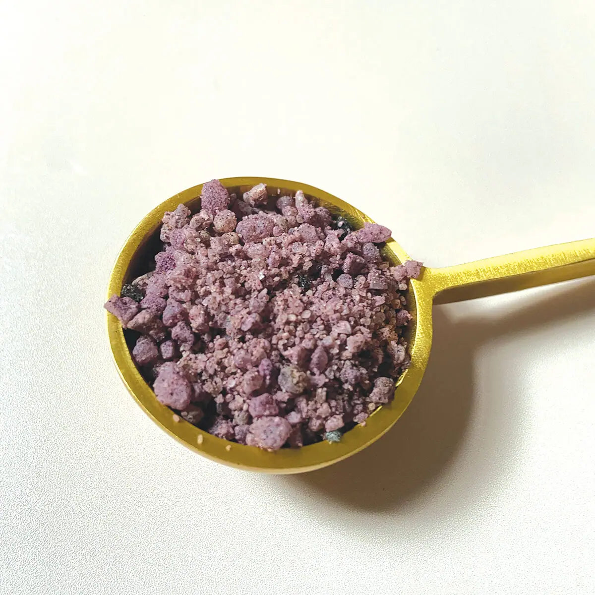 OM radiance bath soak on spoon 