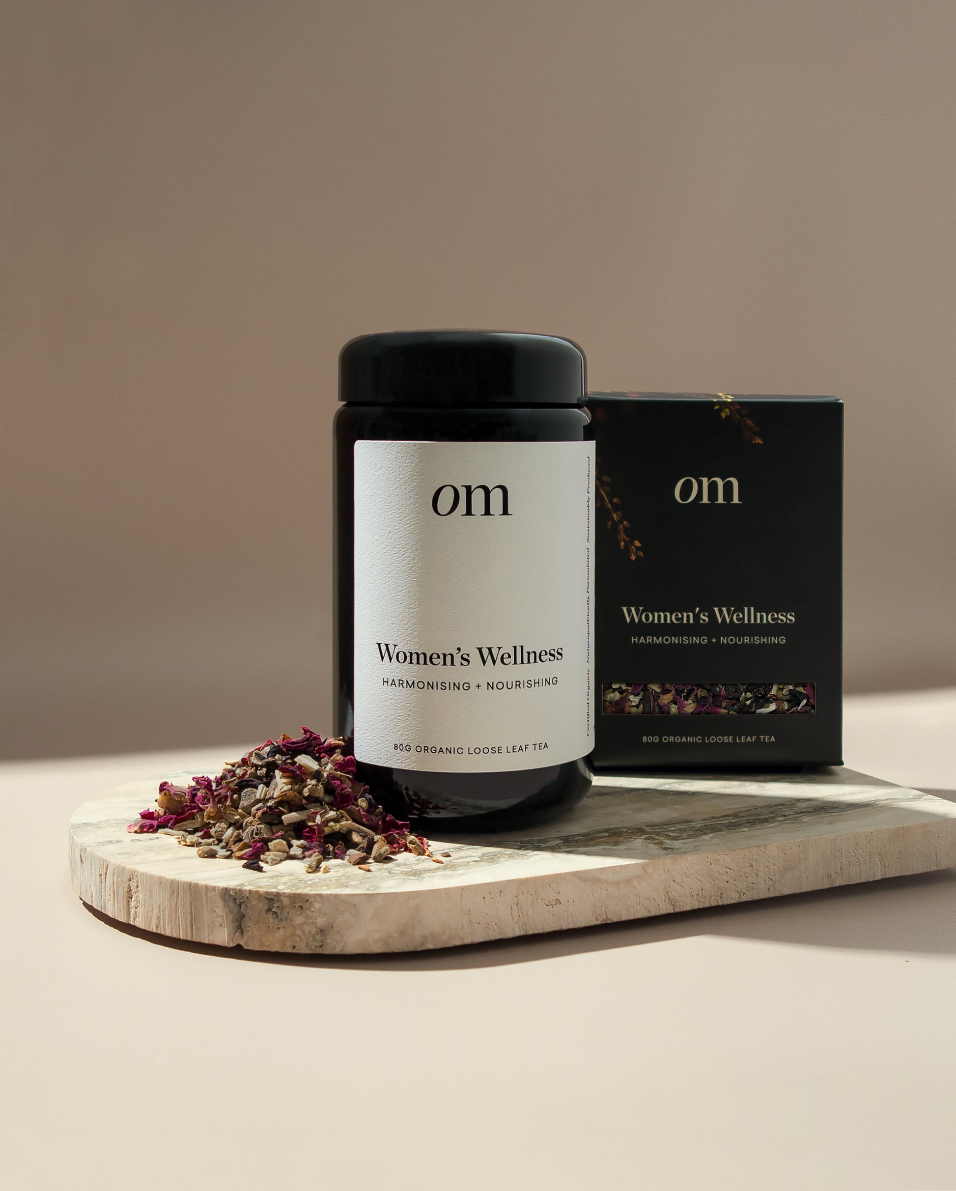 Organic Merchant women's wellness tea jar and box image