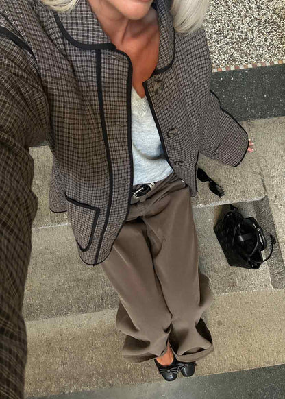 Modström Omine jacket in check on model 2