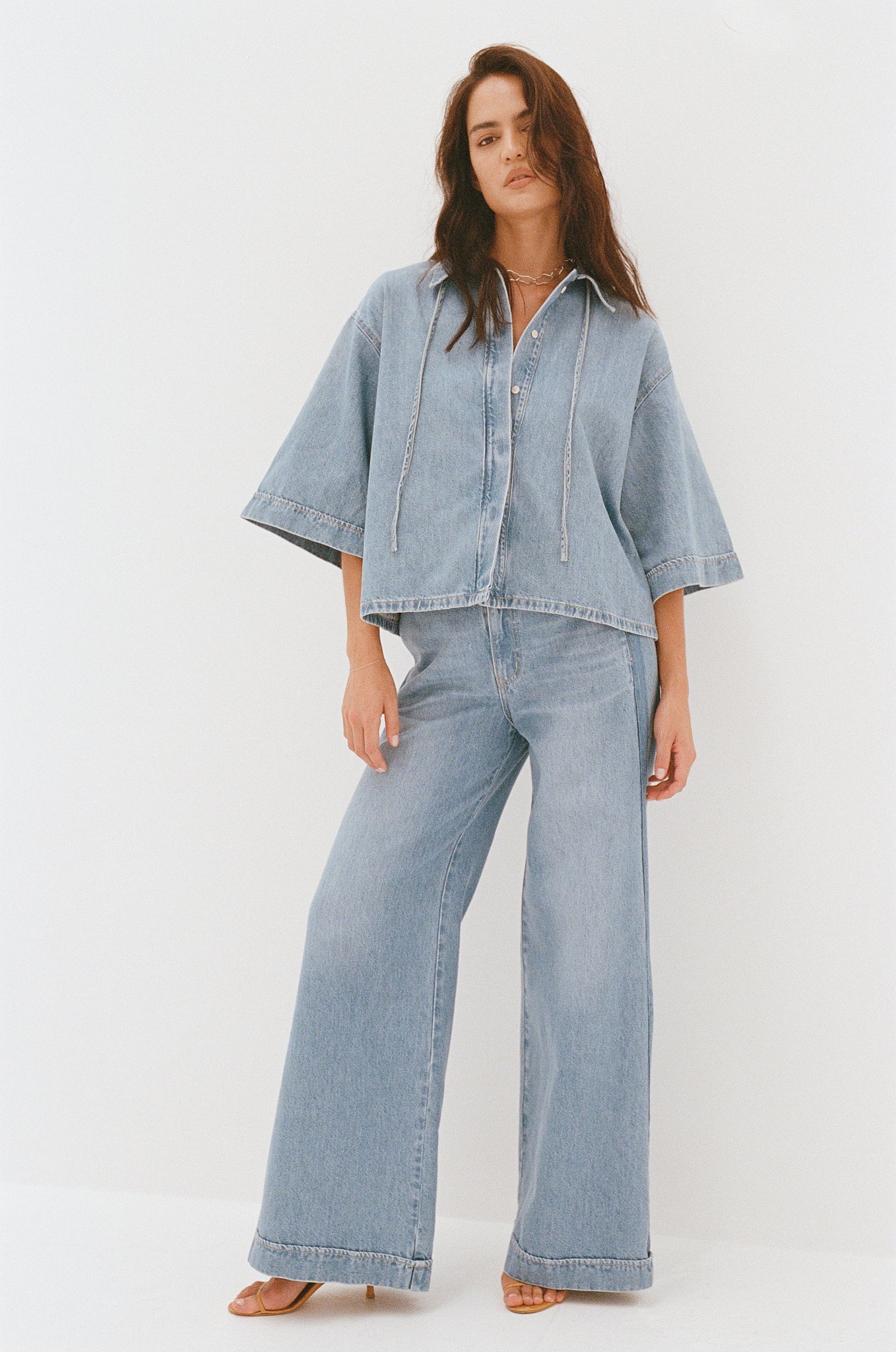 Outland Denim Lotus Pants in bluejay campaign shot in film 2