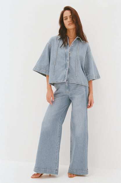 Outland Denim Lotus Pants in bluejay campaign shot in film 2