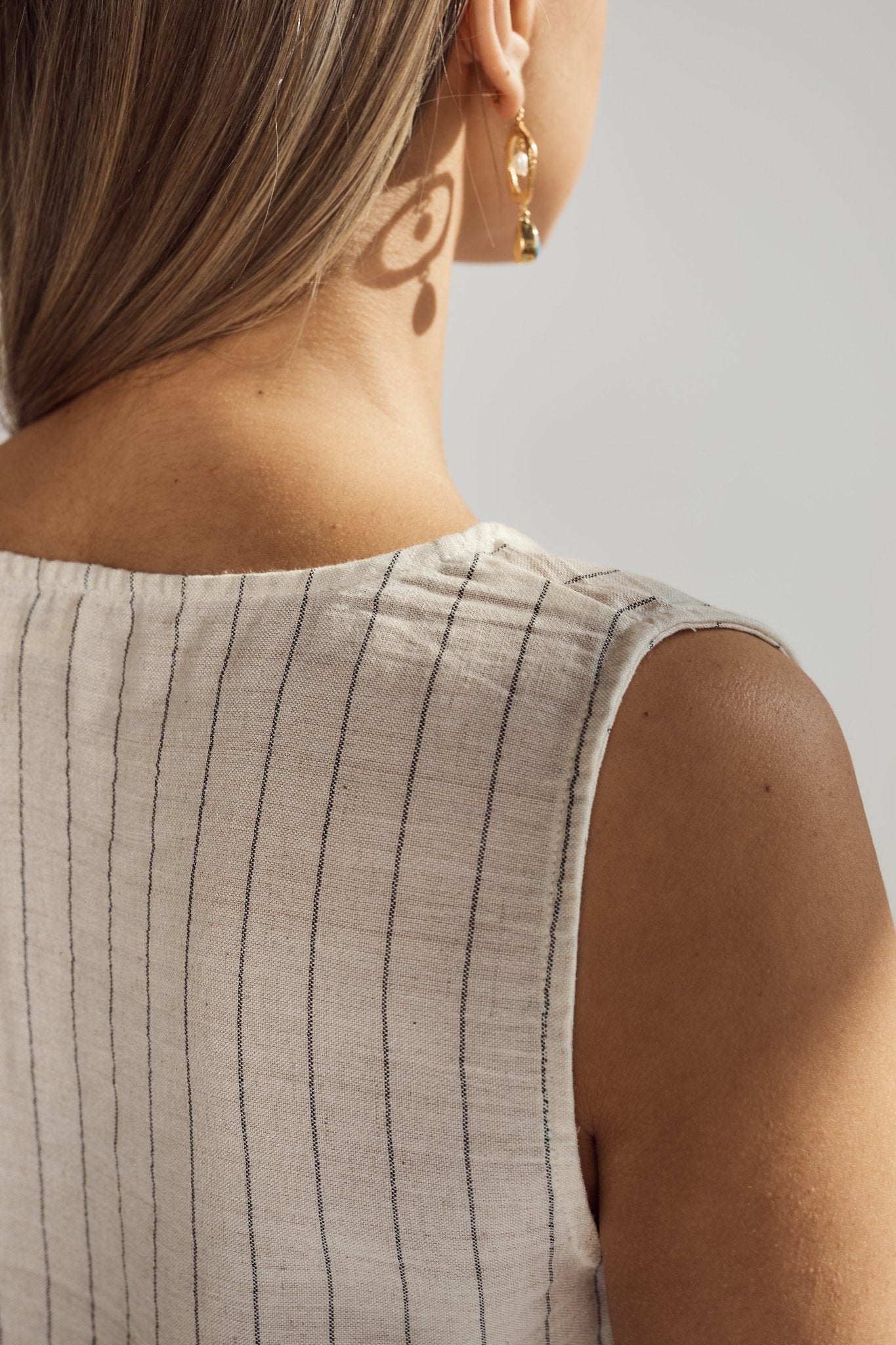 Patara Life linen top and shorts set – black stripe close up of back 