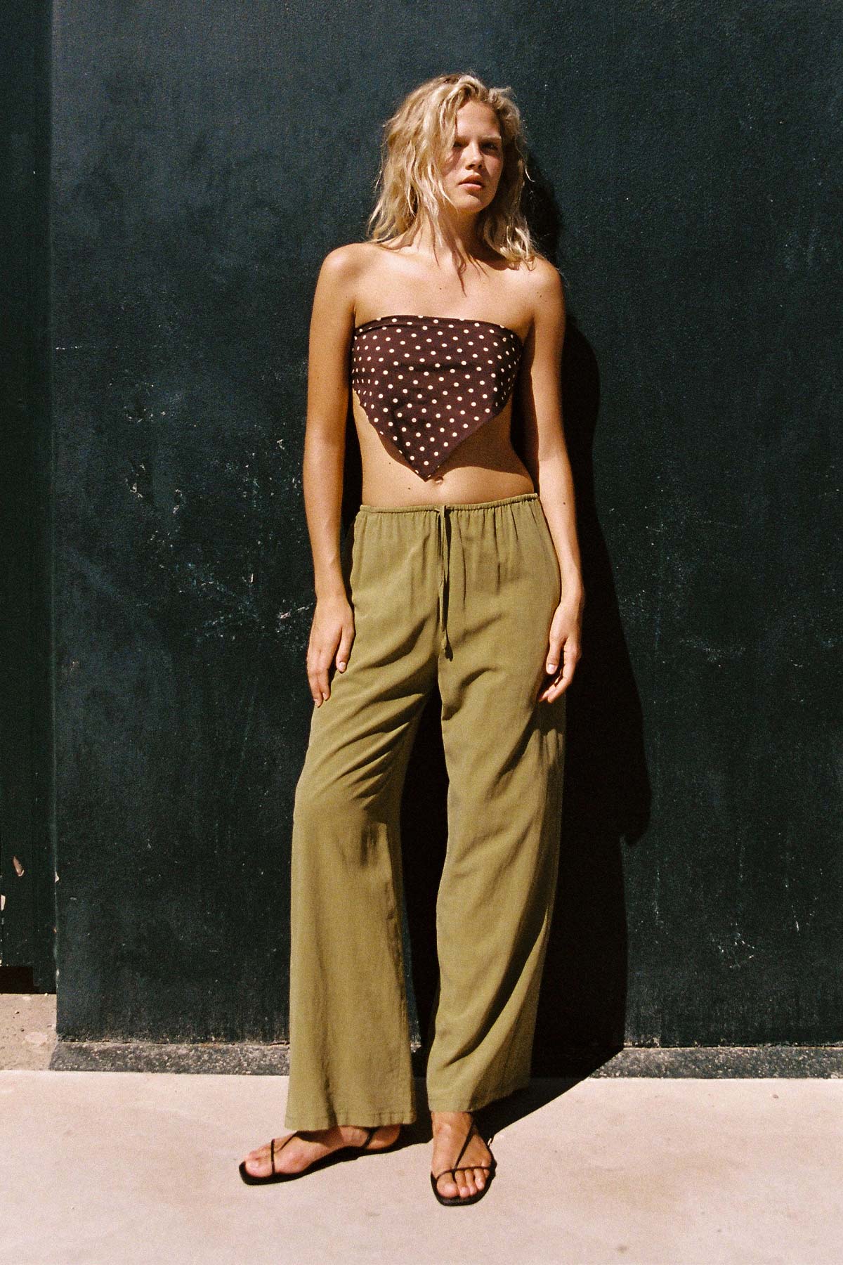 Rowie the label Tia palazzo pants in palm green campaign shot 1