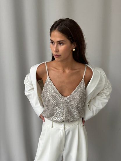 Charli Sienna cami in silver sequin jacket off shoulders