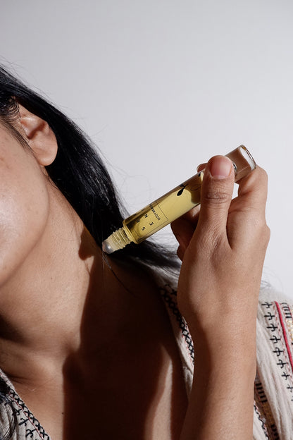 model using serene roll-on perfume oil 
