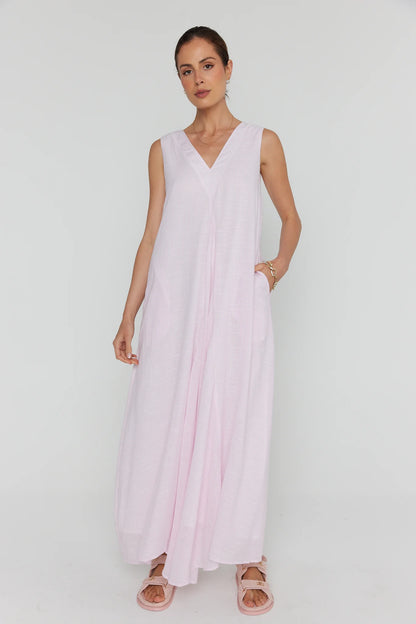 Alexandra Simi cotton dress in pink hand in pocket
