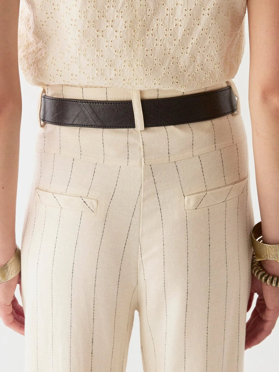 Maison Hotel Honky Tonk Belt in black back shot on cream pants