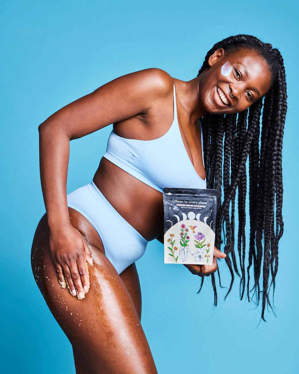 Model applying Bopo stardust sugar scrub 