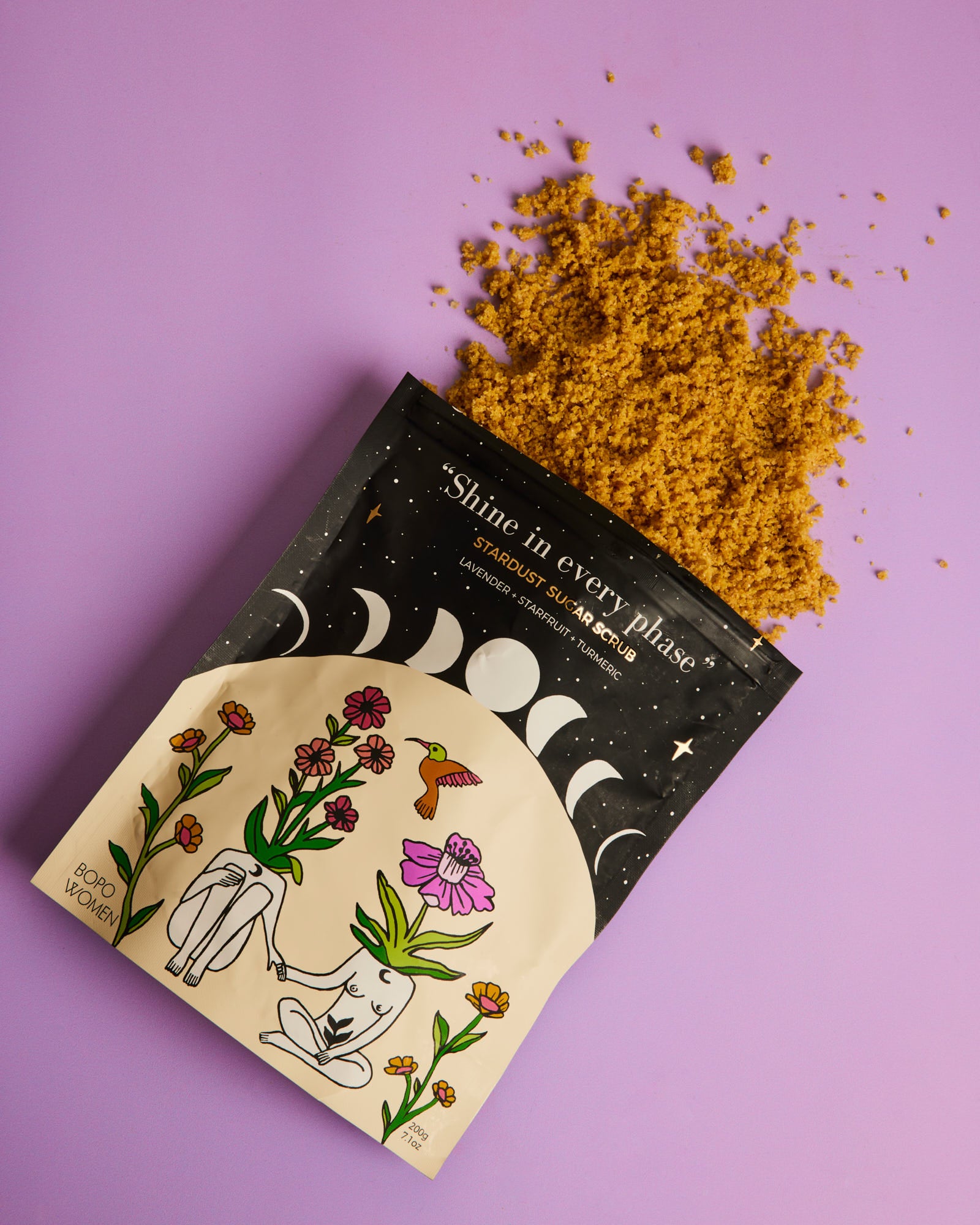 Bopo stardust sugar scrub product spilling out