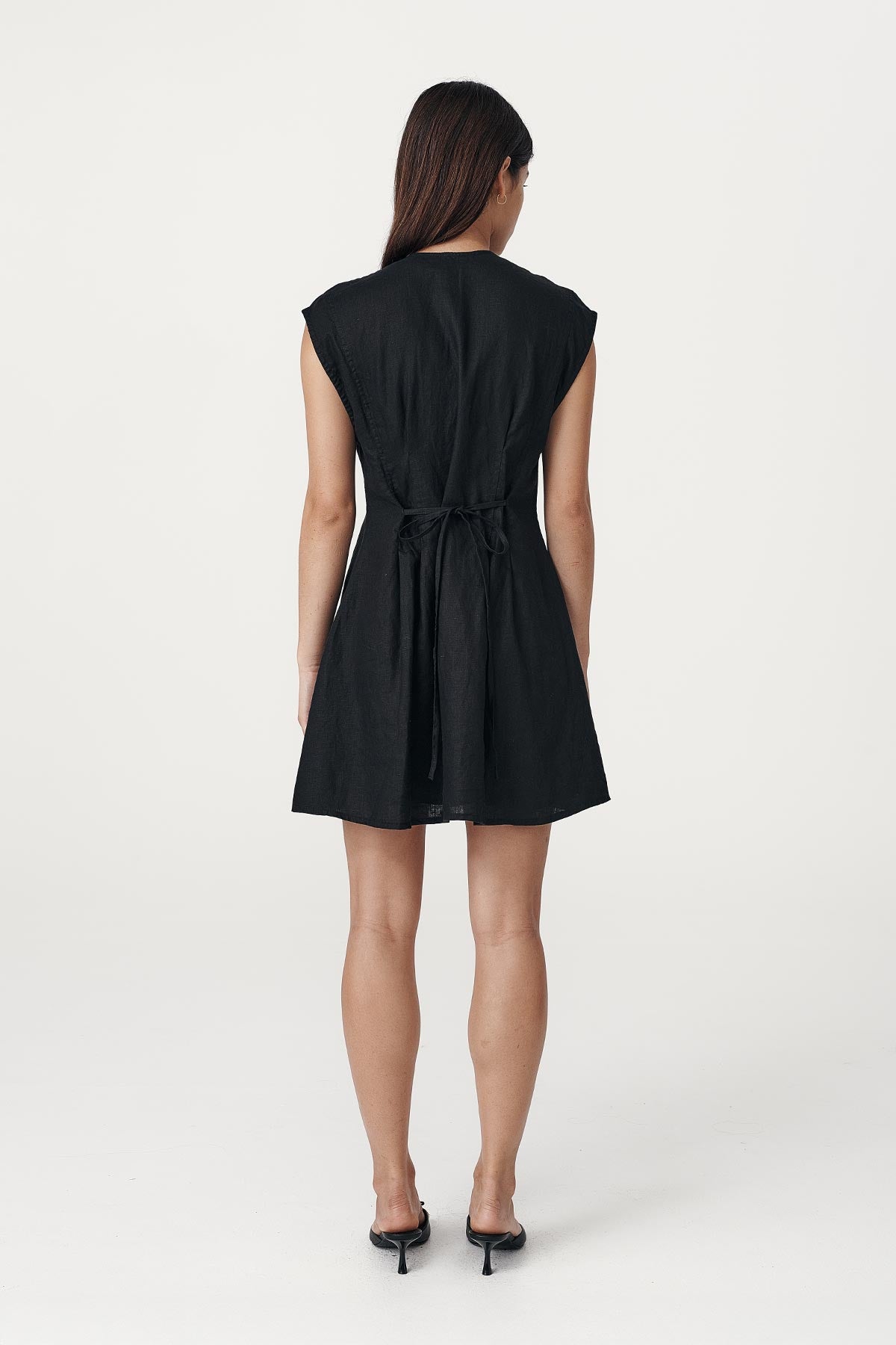 Rowie the label Mira dress in noir studio back shot